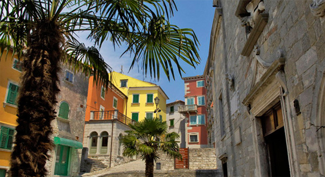 Walk through the narrow streets of the Old Town Labin